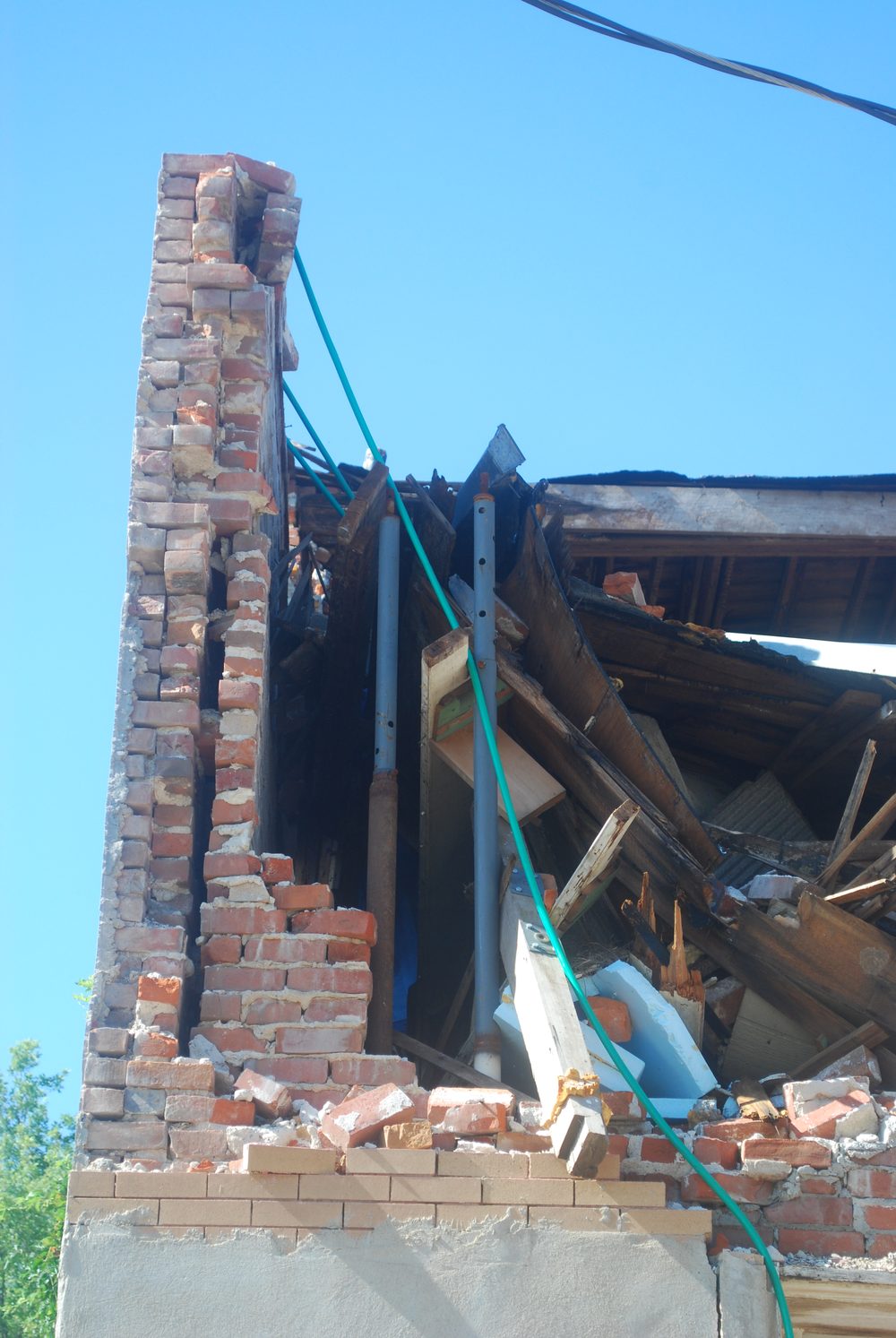 Close forensic detail of masonry failure at the collapse zone
